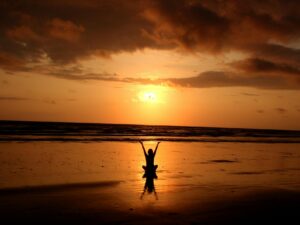 silhouette of person raising its hand